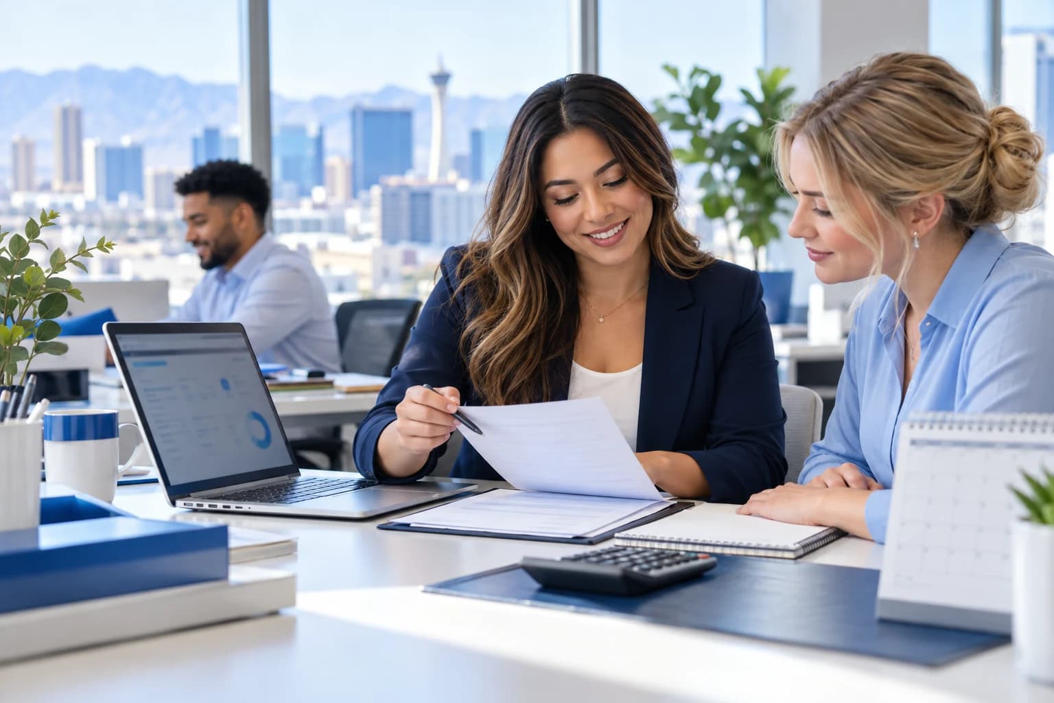 Employer reviewing payroll records with an advisor