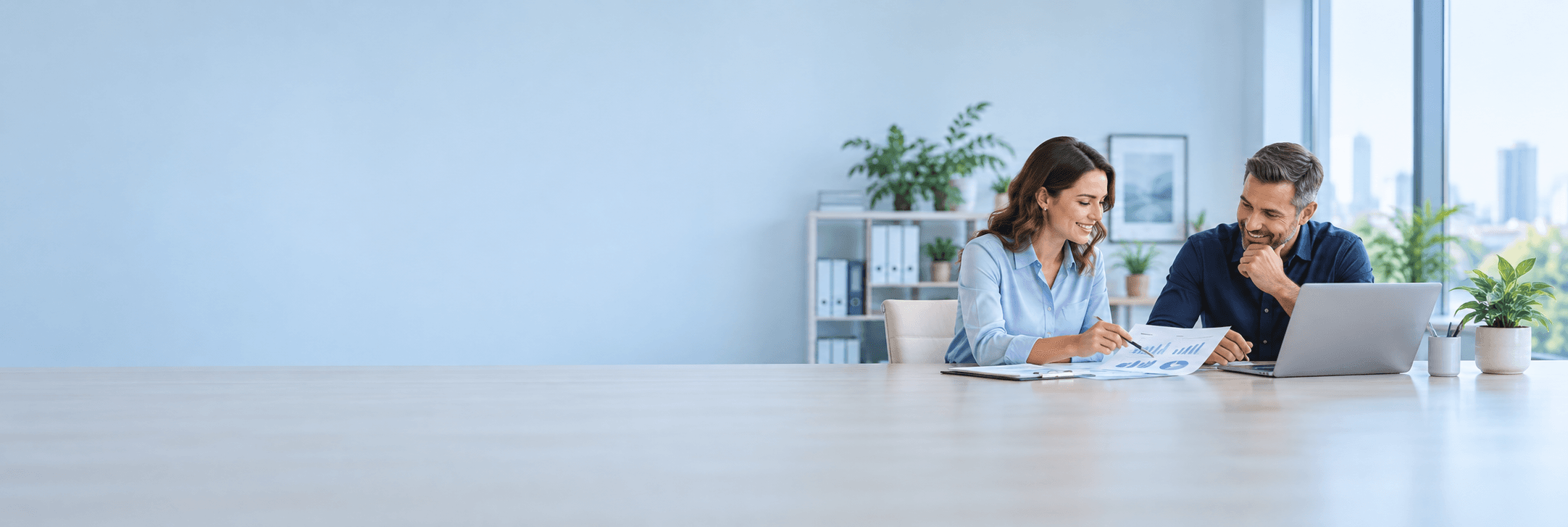 Accountant discussing financial reports with a small business owner