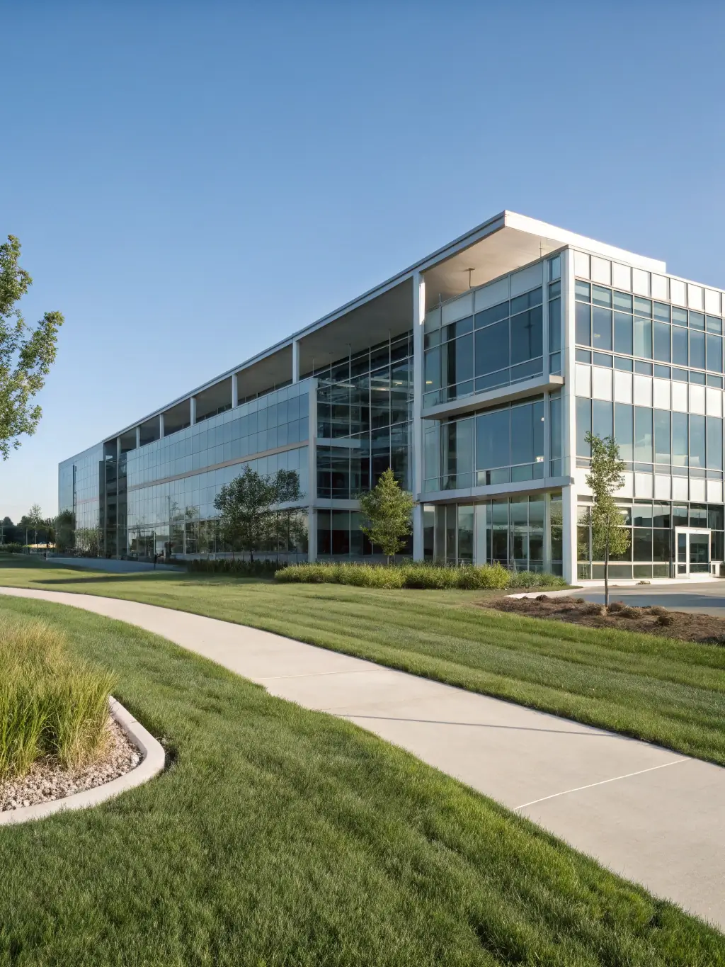 A modern, minimalist architectural design of a real estate building, emphasizing clean lines and sustainable materials, bathed in soft morning light, showcasing financial growth.
